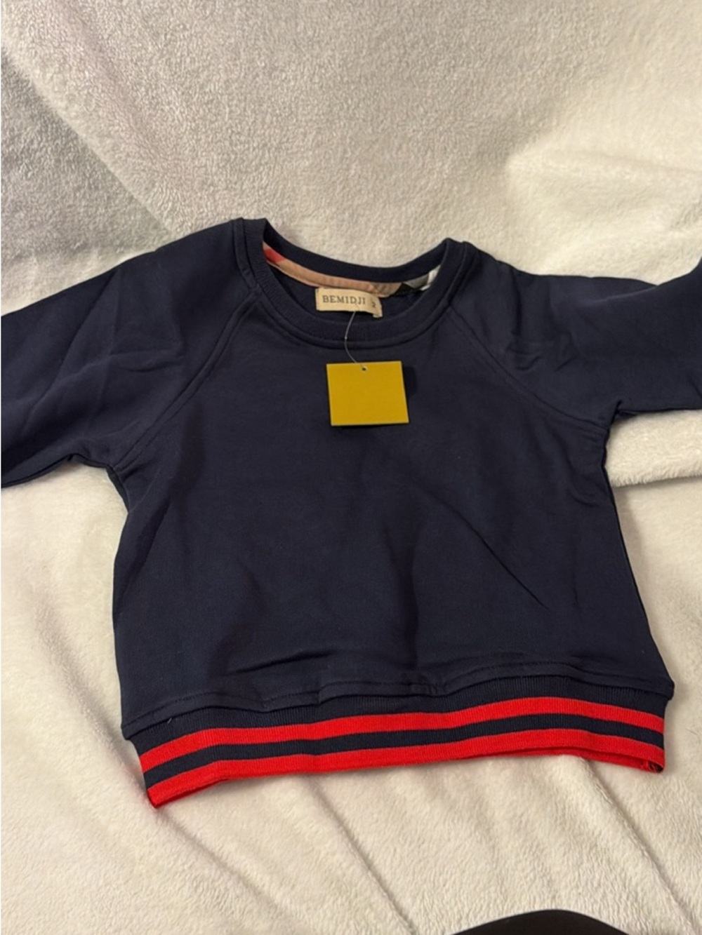 Navy Kids Sweatshirt with Red Stripe Hem